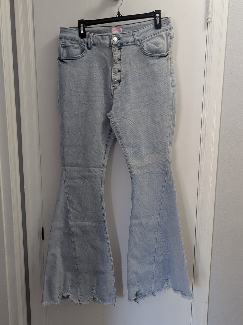 Flared Jeans - Distressed Hem